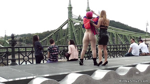 Redhead double penetration in public bar