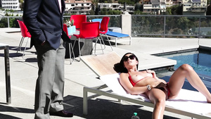 Young babysitter in red string bikini gives an expert level blowjob