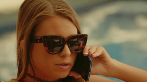 Pretty young chick Jill gives BJ in the pool and gets doggy fucked