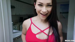 Dark haired floozy with sparkling eyes spreads her pussy lips