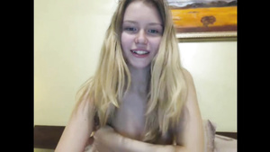 Cute teen undresses and orgasms in front of her webcam