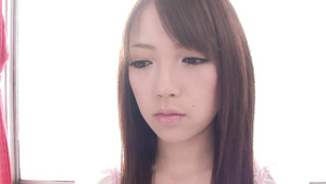 Asian sweetie rubs hairy pussy through pink panties