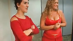 Two milf lesbians snogging and humping each other on the floor