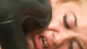 Two brunette babes walk on blonde in high-heeled boots