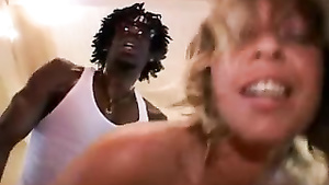 White blonde rubs black dick with boobs and gets ass fucked