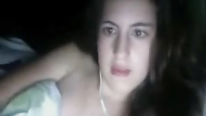 Playful brunette babe rubs hairy pussy late at night