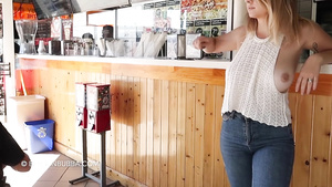 She shows her big tits in the bar