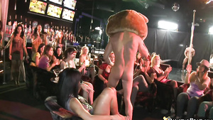 Hot drunk girls have fun in the club with naked guys