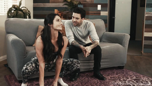 Black-haired MILF pleasuring tattooed dude on the couch