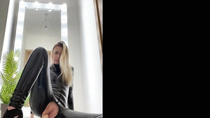 Babe in a tight outfit does some teasing